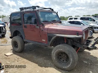 2002 Jeep Wrangler X with VIN 1J4FA39SX2P732881, listed as a Copart auction lot 64451185 with Not provided miles and Clean title. Bid and sale history available at DreamBid. Image 4.