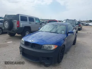 2008 BMW 1 Series 135i with VIN WBAUC73598VF23878, listed as a IAAI auction lot 41569879 with 186,622 mi miles. Bid and sale history available at carsss.com. Image 2.