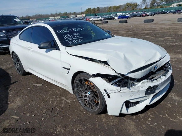 2019 BMW M4 with VIN WBS4Y9C5XKAG67446, listed as a IAAI auction lot 41669865 with 103,230 mi miles. Bid and sale history available at carsss.com. Image 1.