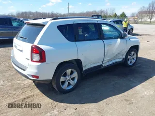 2016 Jeep Compass High Altitude Edition with VIN 1C4NJDEBXGD635864, listed as a IAAI auction lot 41895063 with 95,246 mi miles. Bid and sale history available at carsss.com. Image 4.