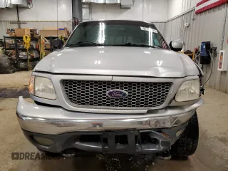 1999 Ford F-150 with VIN 1FTRX18W2XKB01444, listed as a Copart auction lot 52717195 with 210,581 mi miles and Clean title. Bid and sale history available at DreamBid. Image 5.