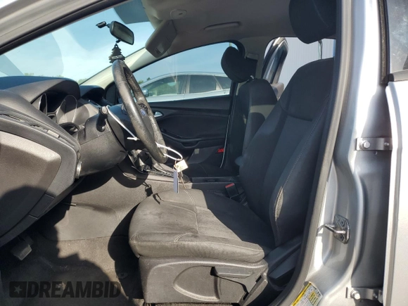 2017 Ford Focus SE with VIN 1FADP3FE9HL273889, listed as a Copart auction lot 53737055 with 114,700 mi miles and Salvage Title. Bid and sale history available at DreamBid. Image 7.