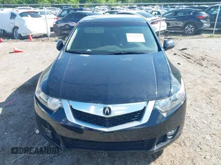 2009 Acura TSX with VIN JH4CU26659C011482, listed as a IAAI auction lot 42212079 with 243,119 mi miles. Bid and sale history available at carsss.com. Image 6.