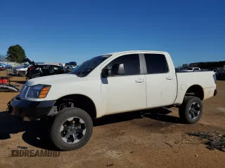 2004 Nissan Titan LE with VIN 1N6AA07B64N516636, listed as a Copart auction lot 86835664 with 101,015 mi miles and Salvage Title. Bid and sale history available at carsss.com. Image 1.