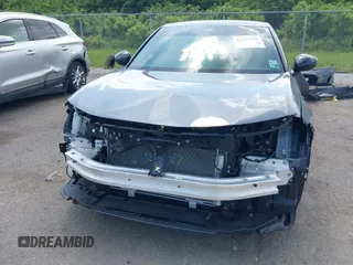 2025 Honda Civic Sport with VIN 2HGFE2F54SH564003, listed as a IAAI auction lot 42123436 with 7,042 mi miles and . Bid and sale history available at DreamBid. Image 13.