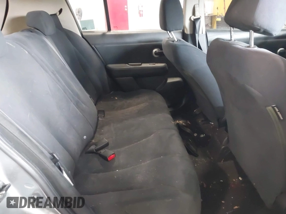 2009 Nissan Versa S with VIN 3N1BC13E59L498891, listed as a IAAI auction lot 42341967 with 156,007 mi miles and . Bid and sale history available at DreamBid. Image 8.