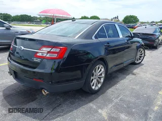 2013 Ford Taurus Limited with VIN 1FAHP2F84DG220283, listed as a IAAI auction lot 40045974 with 155,409 mi miles and . Bid and sale history available at DreamBid. Image 13.
