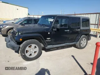 2007 Jeep Wrangler Unlimited Sahara z VIN 1J4GB59177L130619, wystawiony jako Copart lot #48937495 z przebiegiem 175 990 mil mil oraz Szkoda całkowita • Salvage title. Historia ofert i sprzedaży dostępna na DreamBid. Obrazek 1.