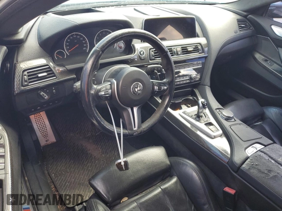 2016 BMW M6 z VIN WBS6E9C51GG437085, wystawiony jako Copart lot #78982124 z przebiegiem Nie podano mil oraz Szkody całkowita. Historia ofert i sprzedaży dostępna na DreamBid. Obrazek 8.