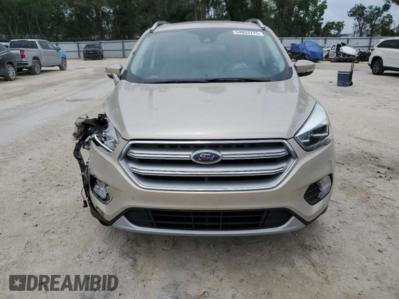 2017 Ford Escape Titanium with VIN 1FMCU0J95HUB96659, listed as a Copart auction lot 54053775 with 69,744 mi miles and Salvage Title. Bid and sale history available at DreamBid. Image 5.