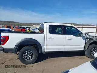 2021 Ford F-150 Raptor with VIN 1FTFW1RG6MFC29395, listed as a IAAI auction lot 41856716 with 73,487 mi miles and . Bid and sale history available at carsss.com. Image 14.