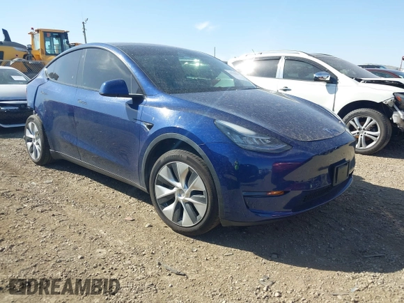 2021 Tesla Model Y Standard Range z VIN 5YJYGDED6MF107711, wystawiony jako IAAI lot #41794384 z przebiegiem 86 934 mil mil oraz . Historia ofert i sprzedaży dostępna na DreamBid. Obrazek 1.