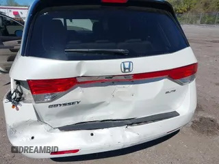 2015 Honda Odyssey Touring Elite with VIN 5FNRL5H96FB090702, listed as a IAAI auction lot 41825889 with 118,157 mi miles and . Bid and sale history available at DreamBid. Image 6.