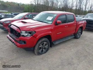 2017 Toyota Tacoma SR5 with VIN 3TMCZ5AN6HM052025, listed as a IAAI auction lot 41952748 with 140,016 mi miles. Bid and sale history available at carsss.com. Image 2.