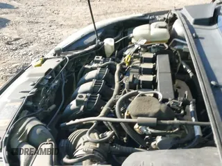 2014 Ford Focus Titanium z VIN 1FADP3N25EL269745, wystawiony jako IAAI lot #43100661 z przebiegiem 177 043 mil mil oraz . Historia ofert i sprzedaży dostępna na DreamBid. Obrazek 13.