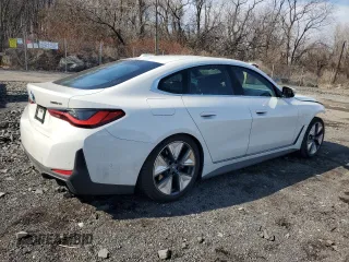 2024 BMW i4 xDrive40 z VIN WBY83FB06RFS94880, wystawiony jako Copart lot #45084805 z przebiegiem 7 053 mil mil oraz Szkoda całkowita • Salvage title. Historia ofert i sprzedaży dostępna na DreamBid. Obrazek 3.