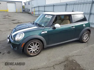 2010 MINI Hardtop S with VIN WMWMF7C51ATW88877, listed as a Copart auction lot 53090015 with 112,115 mi miles and Clean Title. Bid and sale history available at DreamBid. Image 1.