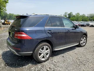 2015 Mercedes-Benz M 350 with VIN 4JGDA5HB2FA529997, listed as a Copart auction lot 59504795 with 69,872 mi miles and Salvage title. Bid and sale history available at DreamBid. Image 3.