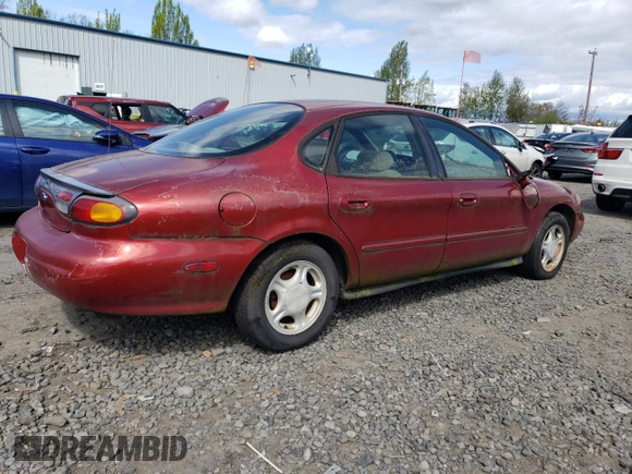 1997 Ford Taurus GL z VIN 1FALP52U4VG234295, wystawiony jako Copart lot #51112714 z przebiegiem 118 005 mil mil oraz Szkoda całkowita • Salvage title. Historia ofert i sprzedaży dostępna na DreamBid. Obrazek 3.