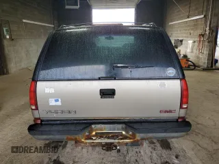 1998 GMC Yukon with VIN 1GKEC13R9WJ715363, listed as a Copart auction lot 81483814 with 186,437 mi miles and Salvage Title. Bid and sale history available at carsss.com. Image 6.