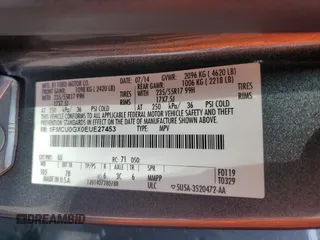 2014 Ford Escape SE z VIN 1FMCU0GX0EUE27453, wystawiony jako Copart lot #59437875 z przebiegiem 154 177 mil mil oraz Czysty tytuł • Clean title. Historia ofert i sprzedaży dostępna na DreamBid. Obrazek 13.