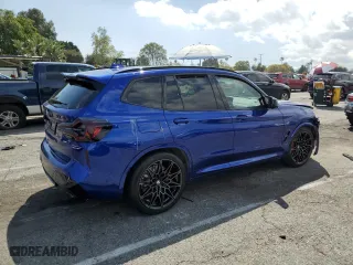 2022 BMW X3 M with VIN 5YM13EC09N9L69499, listed as a Copart auction lot 48758124 with 0 mi miles. Bid and sale history available at carsss.com. Image 3.