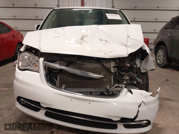2016 Chrysler Town & Country Touring with VIN 2C4RC1BG1GR185657, listed as a IAAI auction lot 41905462 with 167,142 mi miles and . Bid and sale history available at DreamBid. Image 13.