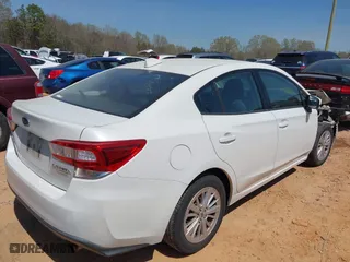 2017 Subaru Impreza Premium with VIN 4S3GKAB63H3617614, listed as a IAAI auction lot 41908948 with 102,722 mi miles. Bid and sale history available at carsss.com. Image 4.