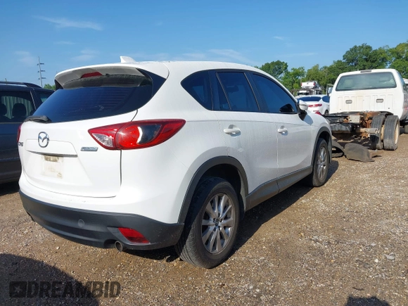 2015 Mazda CX-5 Sport with VIN JM3KE2BE6F0541469, listed as a IAAI auction lot 42632906 with 166,257 mi miles and . Bid and sale history available at DreamBid. Image 4.