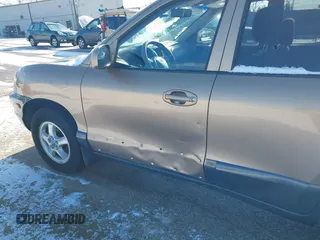 2002 Hyundai Santa Fe GLS with VIN KM8SC73D62U316002, listed as a IAAI auction lot 41249855 with Not Provided miles. Bid and sale history available at carsss.com. Image 6.