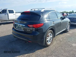 2013 Infiniti FX with VIN JN8CS1MU8DM142478, listed as a IAAI auction lot 42177223 with 156,946 mi miles and . Bid and sale history available at DreamBid. Image 4.