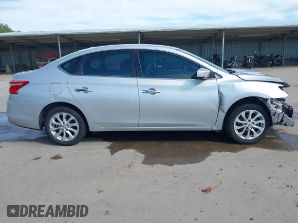 2019 Nissan Sentra SV z VIN 3N1AB7AP1KL604264, wystawiony jako IAAI lot #42304142 z przebiegiem 87 506 mil mil oraz . Historia ofert i sprzedaży dostępna na DreamBid. Obrazek 13.