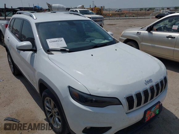 2019 Jeep Cherokee Latitude Plus with VIN 1C4PJLLBXKD220221, listed as a IAAI auction lot 42060125 with 89,452 mi miles and . Bid and sale history available at DreamBid. Image 17.