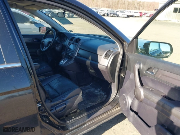 2009 Honda CR-V EX-L with VIN JHLRE48719C022962, listed as a IAAI auction lot 41819577 with 173,266 mi miles. Bid and sale history available at carsss.com. Image 5.