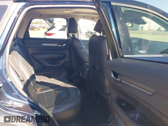 2018 Mazda CX-5 Grand Touring with VIN JM3KFADM1J0322049, listed as a IAAI auction lot 41891079 with 174,939 mi miles and . Bid and sale history available at DreamBid. Image 8.
