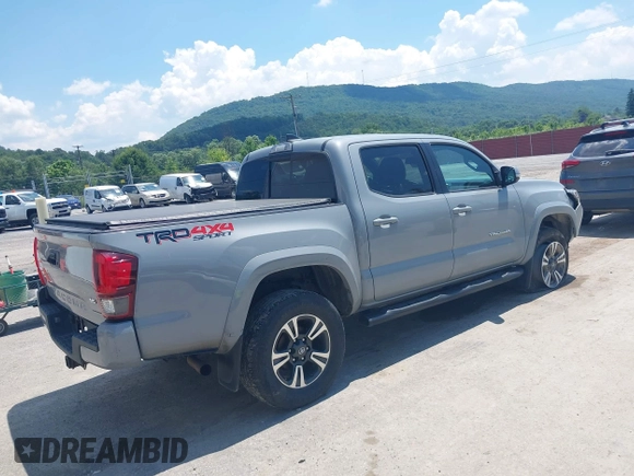 2019 Toyota Tacoma SR with VIN 3TMCZ5AN1KM274625, listed as a IAAI auction lot 42660593 with 163,460 mi miles and . Bid and sale history available at DreamBid. Image 4.