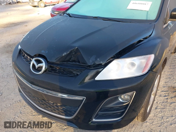 2010 Mazda CX-7 Touring z VIN JM3ER2W35A0351794, wystawiony jako IAAI lot #40688887 z przebiegiem 147 308 mil mil oraz . Historia ofert i sprzedaży dostępna na DreamBid. Obrazek 6.