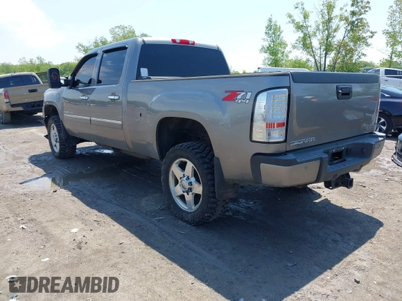 2013 GMC Sierra 2500HD Denali with VIN 1GT125E80DF154320, listed as a IAAI auction lot 42264742 with 171,013 mi miles and . Bid and sale history available at DreamBid. Image 3.
