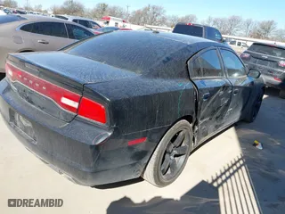 2013 Dodge Charger SE with VIN 2C3CDXBG9DH681172, listed as a IAAI auction lot 41761125 with 117,040 mi miles. Bid and sale history available at carsss.com. Image 4.
