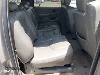 2005 Chevrolet Suburban LS with VIN 3GNEC16ZX5G140284, listed as a IAAI auction lot 42431121 with 320,910 mi miles and . Bid and sale history available at DreamBid. Image 8.
