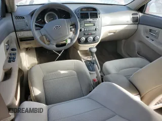 2007 Kia Spectra EX with VIN KNAFE121775427693, listed as a Copart auction lot 76727994 with 100,197 mi miles and Salvage Title. Bid and sale history available at carsss.com. Image 8.