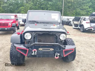 2008 Jeep Wrangler Unlimited Sahara with VIN 1J4GA59128L504798, listed as a IAAI auction lot 42210839 with 162,406 mi miles and . Bid and sale history available at DreamBid. Image 13.