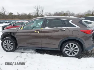 2019 Infiniti QX50 Luxe with VIN 3PCAJ5M30KF129797, listed as a IAAI auction lot 41479436 with 45,902 mi miles and . Bid and sale history available at DreamBid. Image 14.