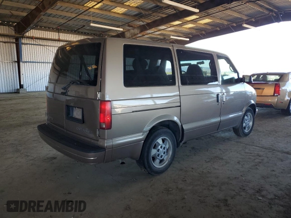 2003 Chevrolet Astro z VIN 1GNDM19X73B124777, wystawiony jako Copart lot #89220995 z przebiegiem 185 322 mil mil oraz Czysty tytuł • Clean title. Historia ofert i sprzedaży dostępna na DreamBid. Obrazek 3.