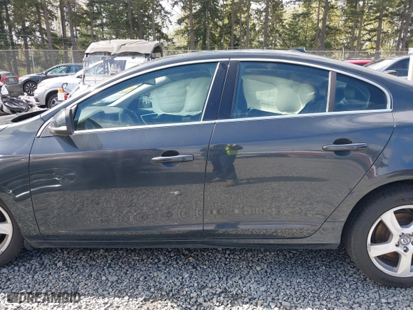 2013 Volvo S60 T5 with VIN YV1612FH5D2221369, listed as a IAAI auction lot 42019723 with 96,002 mi miles. Bid and sale history available at carsss.com. Image 14.