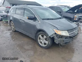 2011 Honda Odyssey Touring with VIN 5FNRL5H95BB007514, listed as a IAAI auction lot 41402516 with 281,032 mi miles. Bid and sale history available at carsss.com. Image 1.