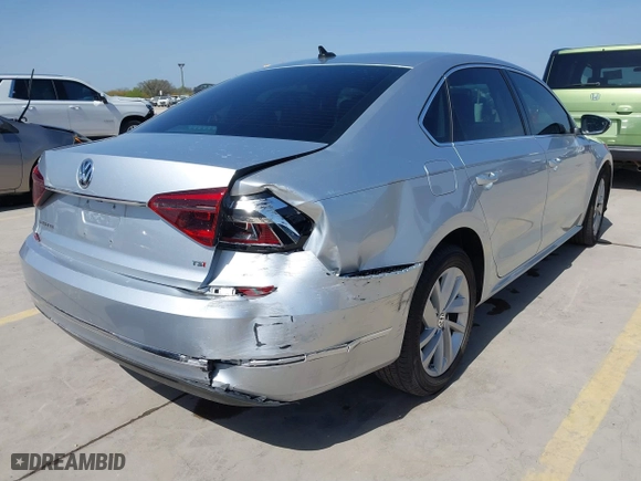 2018 Volkswagen Passat 2.0T SE with VIN 1VWBA7A3XJC045113, listed as a IAAI auction lot 41814006 with 59,095 mi miles. Bid and sale history available at carsss.com. Image 4.