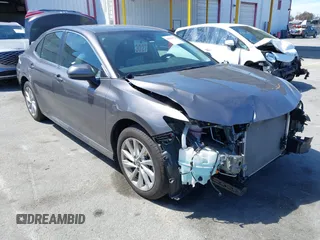 2023 Toyota Camry LE z VIN 4T1C11AK7PU100837, wystawiony jako IAAI lot #42024574 z przebiegiem 24 748 mil mil oraz . Historia ofert i sprzedaży dostępna na DreamBid. Obrazek 1.