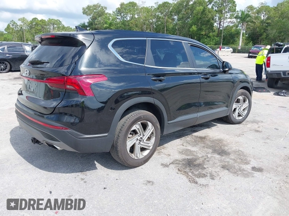 2021 Hyundai Santa Fe SE z VIN 5NMS14AJ0MH332918, wystawiony jako IAAI lot #42365534 z przebiegiem 58 720 mil mil oraz . Historia ofert i sprzedaży dostępna na DreamBid. Obrazek 4.