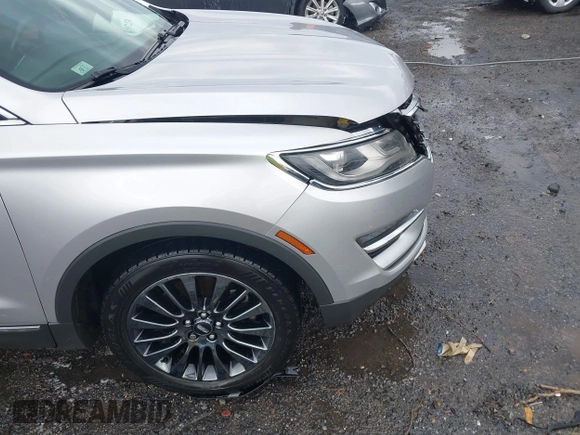 2015 Lincoln MKC z VIN 5LMCJ1A95FUJ20349, wystawiony jako IAAI lot #41695129 z przebiegiem 140 878 mil mil oraz . Historia ofert i sprzedaży dostępna na DreamBid. Obrazek 18.